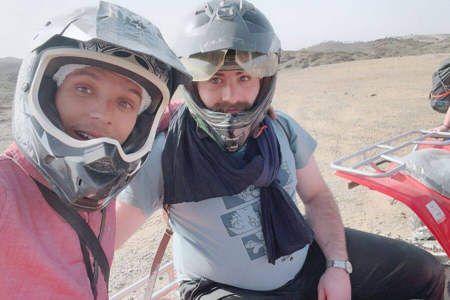 Experiência de passeio de camelo e moto-quatro no deserto rochoso de Agafay